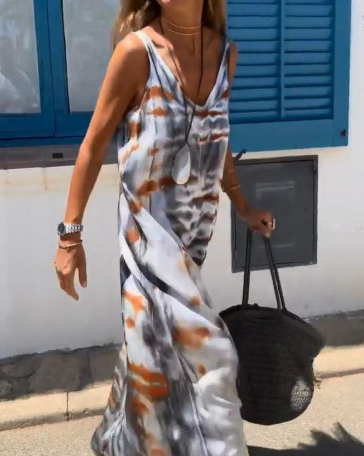 SORIA – Mouwloze jurk met tie-dye print
